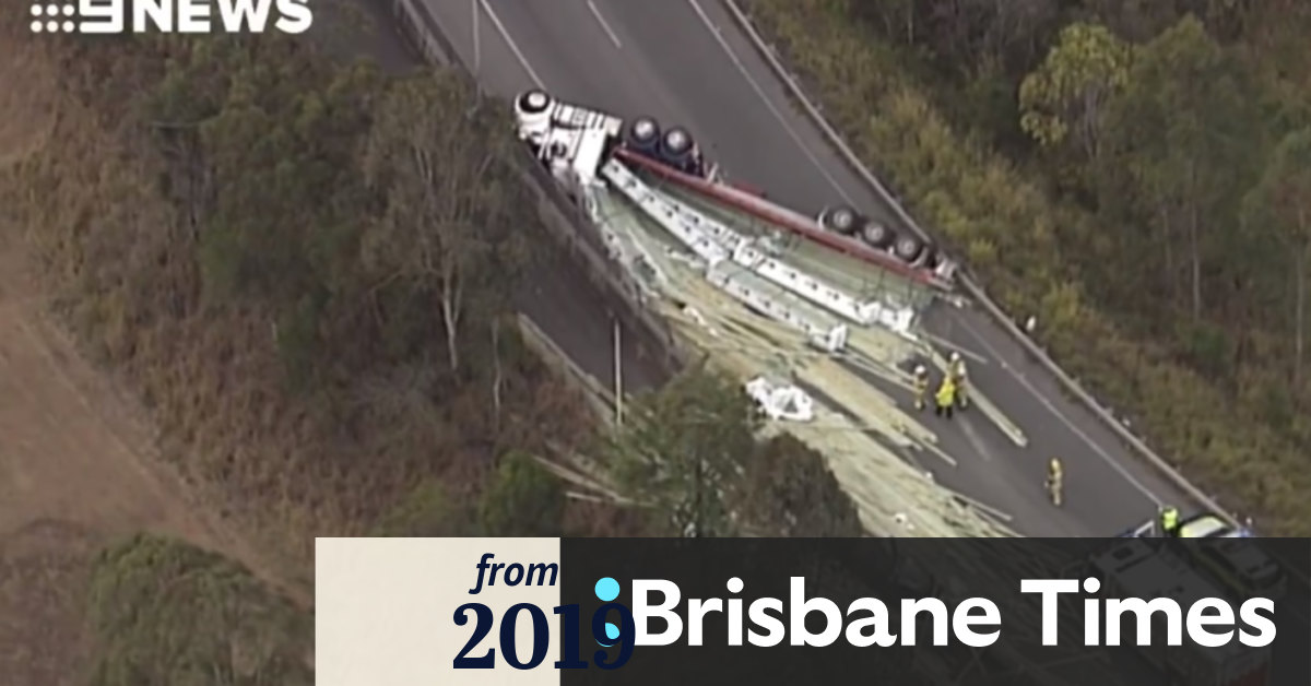 M1 traffic at standstill after truck rolls at Gateway Motorway onramp